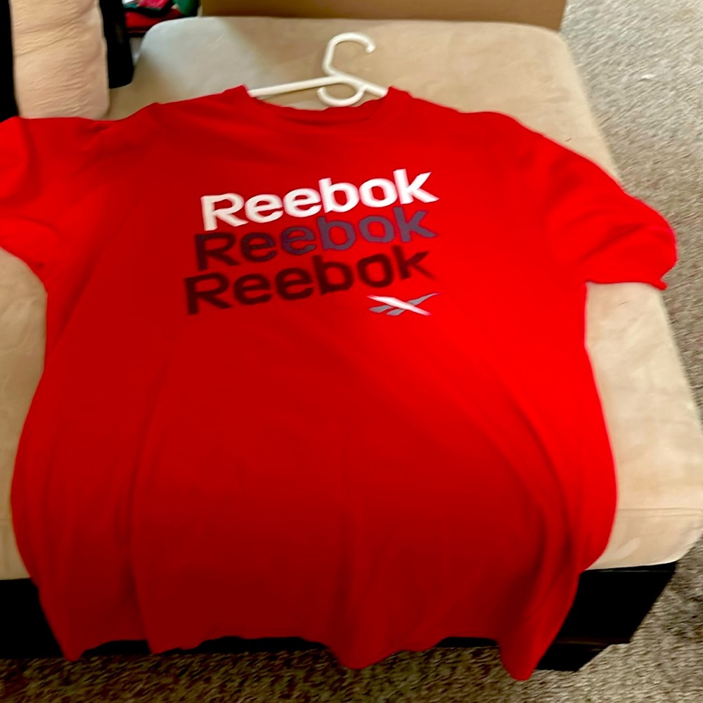Large red Reebok shirt